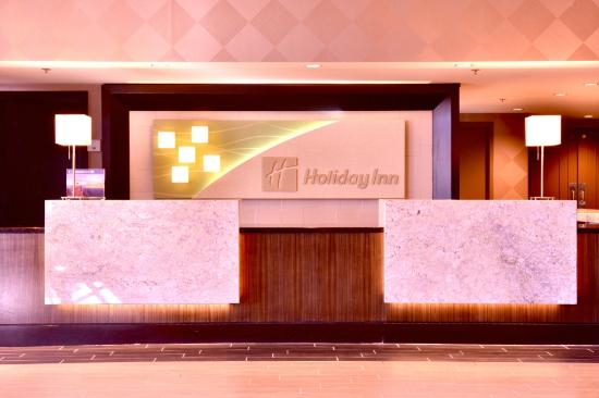 Image of Holiday Inn Dallas Central-Park Cities front desk